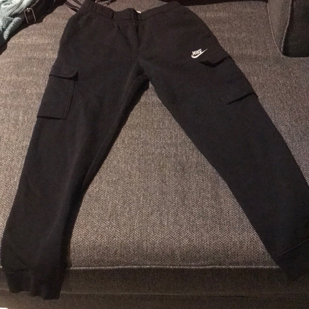 A Nike sweater and Nike sweatpants